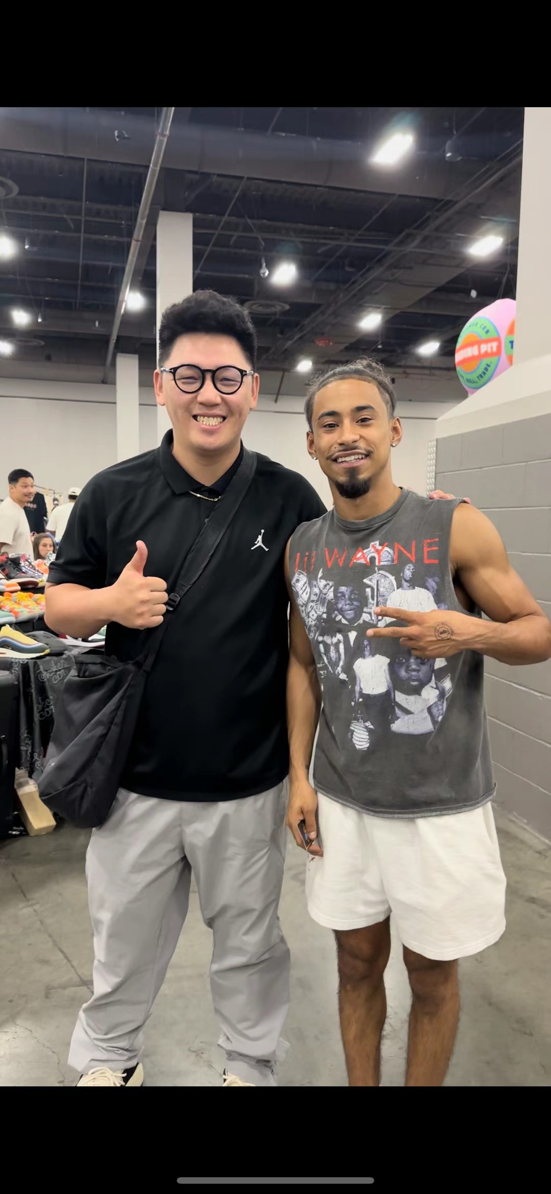 Cody with an athlete at an international sneaker culture event